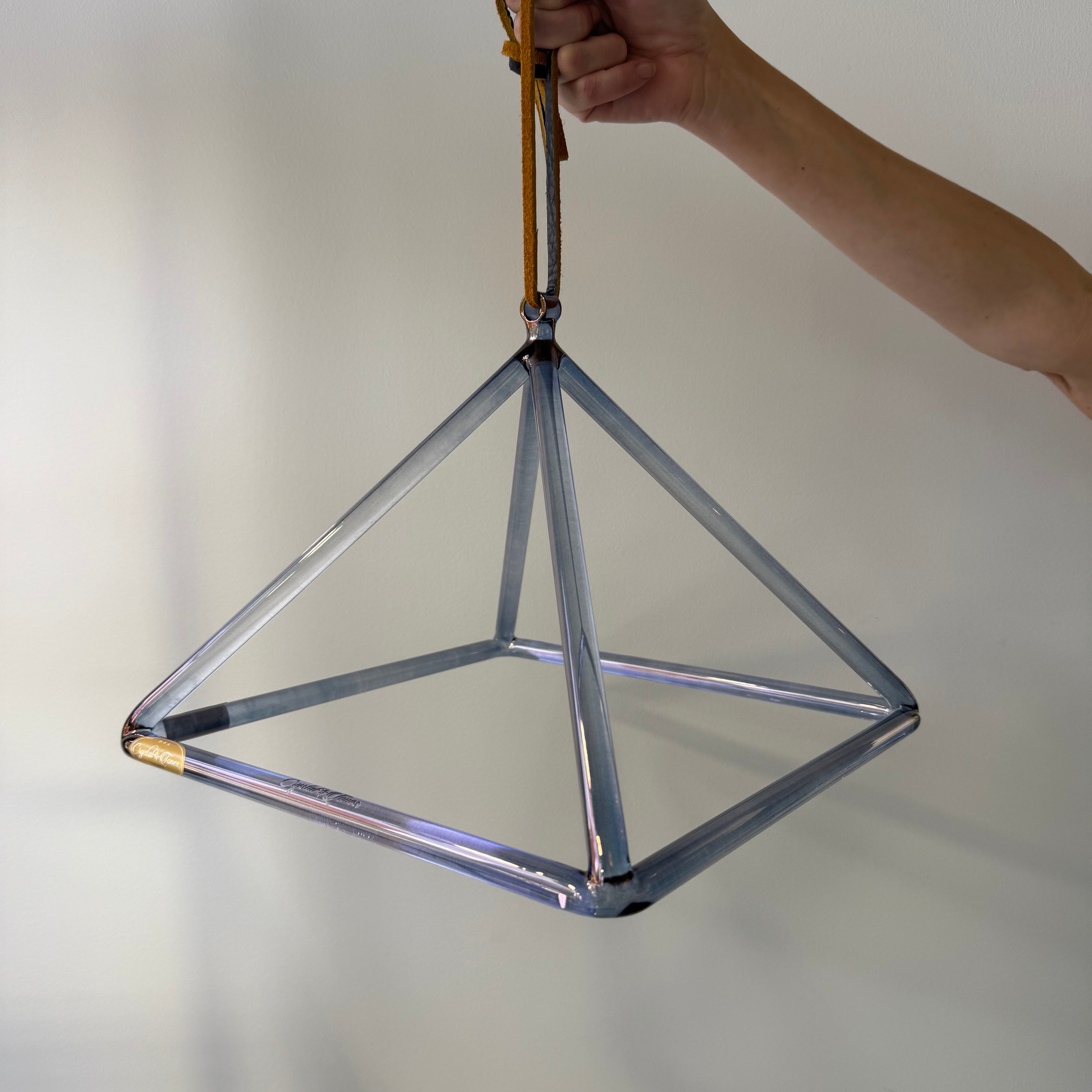 Crystal Singing Pyramids and Merkabas